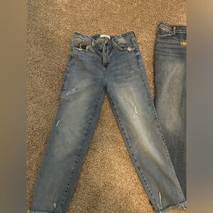 2 pairs of Risen brand jeans. One pair is NWT other is like new. Size 13/31